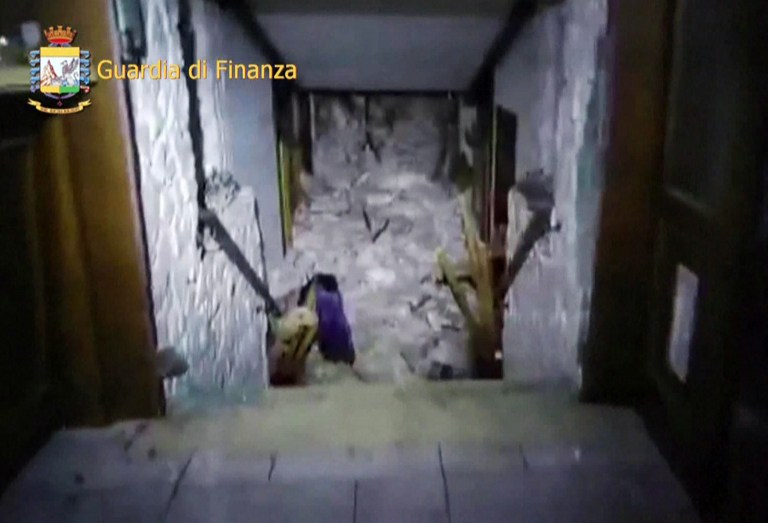 This image grab made from a video handout released by the Guardia di Finanza on January 19, 2017 shows a wall of snow engulfing the inside of the Hotel Rigopiano, near the village of Farindola, on the eastern lower slopes of the Gran Sasso mountain.
Up to 30 people were feared to have died after an Italian mountain Hotel Rigopiano was engulfed by a powerful avalanche in the earthquake-ravaged centre of the country. Italy's Civil Protection agency confirmed the Hotel Rigopiano had been engulfed by a two-metre (six-feet) high wall of snow and that emergency services were struggling to get ambulances and diggers to the site.
/ AFP PHOTO / Guardia di Finanza press office AND AFP PHOTO / Handout / RESTRICTED TO EDITORIAL USE - MANDATORY CREDIT "AFP PHOTO / GUARDIA DI FINANZA " - NO MARKETING NO ADVERTISING CAMPAIGNS - DISTRIBUTED AS A SERVICE TO CLIENTS