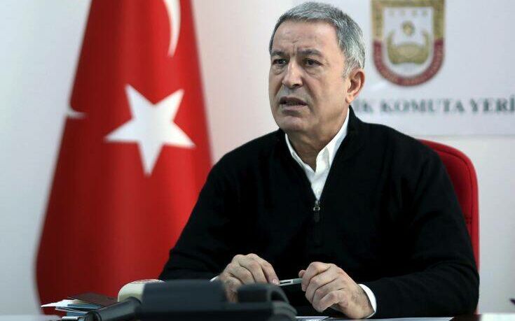 Turkish Defense Minister Hulusi Akar speaks at a military headquarters near the Syrian border in Hatay, Turkey, Sunday, March 1, 2020. Akar said Turkey aimed to confront Syrian government forces rather than Russian troops.(AP Photo)