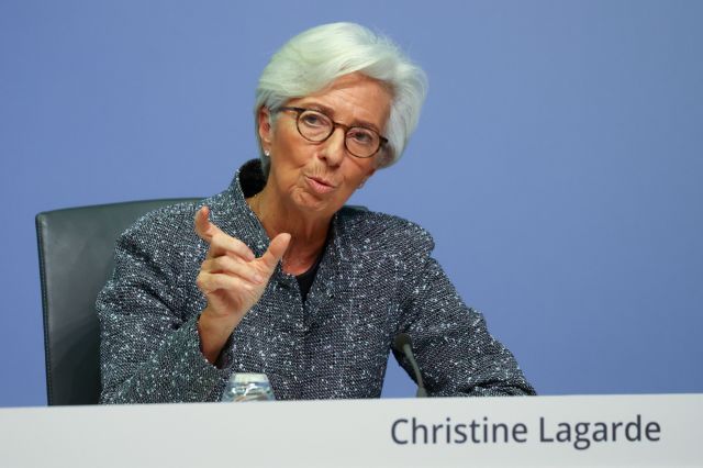 FILE PHOTO: FILE PHOTO: European Central Bank (ECB) President Christine Lagarde gestures during a news conference on the outcome of the meeting of the Governing Council, in Frankfurt, Germany, March 12, 2020. REUTERS/Kai Pfaffenbach/File Photo