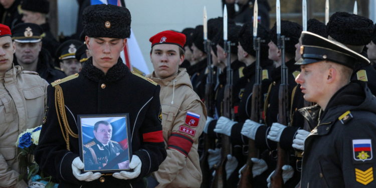 Sailors attend a memorial and funeral service for first rank captain Andrei Paliy, Russia's Black Sea Fleet deputy commander, who was killed in the eastern Ukrainian port city of Mariupol on March 20, in Sevastopol, Crimea March 23, 2022. REUTERS/Alexey Pavlishak     TPX IMAGES OF THE DAY