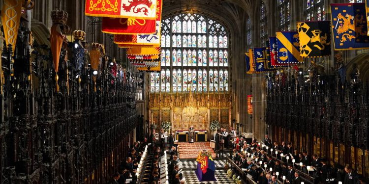 The coffin of Britain's Queen Elizabeth II rests in George's Chapel, Windsor Castle, fro a for a committal service in Windsor, England, Monday, Sept. 19, 2022. (Joe Giddens/Pool Photo via AP)