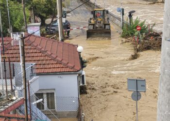 The aftermath of the fierce rainstorms hit central Greece showing the damage from the floods while roads are still covered by floodwater and mud and heavy machinery and bulldozers are cleaning the area, while fire service is pumping water. The city of Volos witnessed flooded and mud-covered cars and other vehicles still in the water on the morning of 7 September 2023, after being hit by Storm Daniel and record rainfall causing deadly flash floods.  Casualties have been reported in addition to missing people while cities, villages and areas are without running water and electricity. In Pelion mountain region, Volos city and Skiathos island restriction in traffic was imposed. Volos, Greece on September 7, 2023 (Photo by Nicolas Economou/NurPhoto) (Photo by Nicolas Economou / NurPhoto / NurPhoto via AFP)