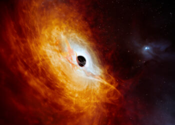 This artist’s impression shows the record-breaking quasar J059-4351, the bright core of a distant galaxy that is powered by a supermassive black hole. Using ESO’s Very Large Telescope (VLT) in Chile, this quasar has been found to be the most luminous object known in the Universe to date. The supermassive black hole, seen here pulling in surrounding matter, has a mass 17 billion times that of the Sun and is growing in mass by the equivalent of another Sun per day, making it the fastest-growing black hole ever known.