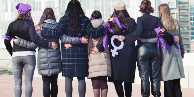 Multiracial group of women only on violence protest