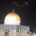 An image-grab from a video taken early on April 14, 2024, shows rocket trails in the sky above the Al-Aqsa Mosque compound in Jerusalem. Iran launched its first-ever direct attack on Israeli territory late on April 13, marking a major escalation of the long-running covert war between the regional foes and sparking fears of a broader conflict breaking out. (Photo by AFP)
