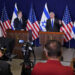 FILE - Israel's Prime Minister Benjamin Netanyahu, right, make statements with Secretary of State Antony Blinken to the media, inside The Kirya, which houses the Israeli Ministry of Defense, after their meeting in Tel Aviv, Oct. 12, 2023. AP Washington photographer Jacquelyn Martin recalls how being one of a few female photographers covering news and politics was useful when she was assigned as the press pooler for Blinken's last-minute trip to Israel and the Middle East in the aftermath of the Hamas attacks. Martin said, “Sometimes people not knowing what to make of you works in your favor.” (AP Photo/Jacquelyn Martin, Pool, File)