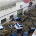 A picture taken in Picanya, near Valencia, eastern Spain, on October 30, 2024 shows cars piled in a stree after floods. Floods triggered by torrential rains in Spain's eastern Valencia region has left 51 people dead, rescue services said on October 30. (Photo by Jose Jordan / AFP)