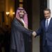 Greek Prime Minister Kyriakos Mitsotakis, right, shakes hands with Saudi Crown Prince Mohammed bin Salman during a welcoming ceremony, in Athens, Tuesday, July 26, 2022. Crown Prince Mohammed bin Salman is visiting Greece Tuesday on his first trip to a European Union country since the killing in 2018 of Saudi journalist Jamal Khashoggi. (AP Photo/Yorgos Karahalis, Pool)