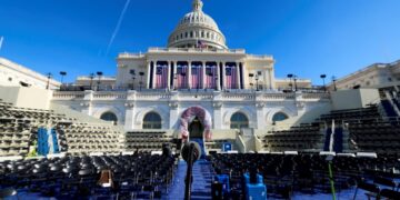 Empty chairs on the inaugural stand are seen on the day it was announced U.S. President-elect Donald Trump's inauguration is being moved indoors due to dangerously cold temperatures expected on Monday, in Washington, U.S., January 17, 2025. REUTERS/Kevin Lamarque