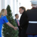 French President Emmanuel Macron is greeted by White House Chief of Protocol Monica Crowley as he arrives at the White House to participate in a G7 leader summit call in Washington, DC, U.S., February 24, 2025.   REUTERS/Brian Snyder