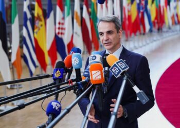 Greek Prime Minister Kyriakos Mitsotakis talks to the press as he attends a European Union summit in Brussels, Belgium March 20, 2025. REUTERS/Yves Herman