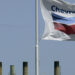 FILE - This April 21, 2008 file photo shows a Chevron flag flying over the Chevron refinery in Richmond, Calif. Chevron Corp. reports quarterly financial results before the market opens on Friday, April 26, 2013. (AP Photo/Ben Margot, File)