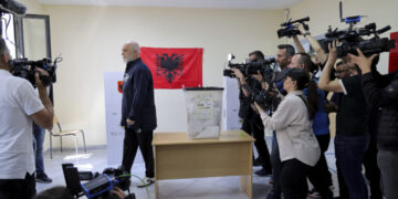 Albania's ruling Socialist party leader Edi Rama leaves a voting station during a general election where Rama is seeking a fourth term as Albania's prime minister in Tirana, Albania Sunday, May 11, 2025. (AP Photo/Vlasov Sulaj)