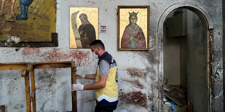 A civil defence member inspects the damage after a blast rocked the Mar Elias Church according to witnesses, in the Dweila neighbourhood of Damascus, Syria June 22, 2025. REUTERS/Firas Makdesi