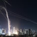 Israeli Iron Dome air defense system fires to intercept missiles over Tel Aviv, Israel, Friday, June 13, 2025. (AP Photo/Tomer Neuberg)