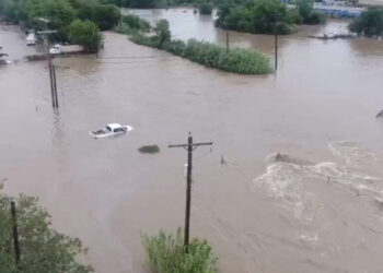A drone view of vehicles partially submerged in flood water following torrential rains that unleashed flash floods along the Concho River in San Angelo, Texas, U.S., July 4, 2025, in this screen grab obtained from a social media video. Patrick Keely/via REUTERS  THIS IMAGE HAS BEEN SUPPLIED BY A THIRD PARTY. MANDATORY CREDIT. NO RESALES. NO ARCHIVES. REFILE - CORRECTING NAME OF RIVER FROM "GUADALUPE" TO "CONCHO" AND MONTH FROM "JUNE" TO "JULY".