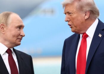 U.S. President Donald Trump speaks with Russian President Vladimir Putin, as they meet to negotiate for an end to the war in Ukraine, at Joint Base Elmendorf-Richardson in Anchorage, Alaska, U.S., August 15, 2025. REUTERS/Kevin Lamarque