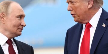 U.S. President Donald Trump speaks with Russian President Vladimir Putin, as they meet to negotiate for an end to the war in Ukraine, at Joint Base Elmendorf-Richardson in Anchorage, Alaska, U.S., August 15, 2025. REUTERS/Kevin Lamarque