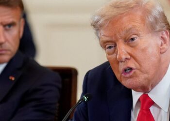 U.S. President Donald Trump speaks during a meeting with French President Emmanuel Macron, Ukrainian President Volodymyr Zelenskiy (not pictured) and European leaders amid negotiations to end the Russian war in Ukraine, at the White House in Washington, D.C., U.S., August 18, 2025. REUTERS/Al Drago
