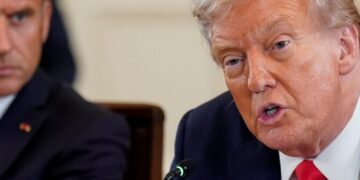 U.S. President Donald Trump speaks during a meeting with French President Emmanuel Macron, Ukrainian President Volodymyr Zelenskiy (not pictured) and European leaders amid negotiations to end the Russian war in Ukraine, at the White House in Washington, D.C., U.S., August 18, 2025. REUTERS/Al Drago
