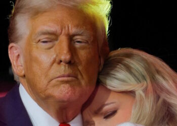 Erika Kirk, wife of slain conservative commentator Charlie Kirk and the new CEO of Turning Point USA, reacts next to U.S. President Donald Trump during a memorial service at State Farm Stadium, in Glendale, Arizona, U.S., September 21, 2025.  REUTERS/Brian Snyder