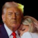 Erika Kirk, wife of slain conservative commentator Charlie Kirk and the new CEO of Turning Point USA, reacts next to U.S. President Donald Trump during a memorial service at State Farm Stadium, in Glendale, Arizona, U.S., September 21, 2025.  REUTERS/Brian Snyder