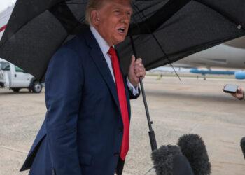 U.S. President Donald Trump speaks to the media before boarding Air Force One, as he departs for Israel, at Joint Base Andrews, Maryland, U.S., October 12, 2025. REUTERS/Evelyn Hockstein