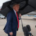 U.S. President Donald Trump speaks to the media before boarding Air Force One, as he departs for Israel, at Joint Base Andrews, Maryland, U.S., October 12, 2025. REUTERS/Evelyn Hockstein