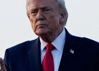U.S. President Donald Trump gestures as he arrives at Palm Beach International Airport in West Palm Beach, Florida, U.S., February 13, 2026. REUTERS/Elizabeth Frantz