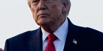 U.S. President Donald Trump gestures as he arrives at Palm Beach International Airport in West Palm Beach, Florida, U.S., February 13, 2026. REUTERS/Elizabeth Frantz