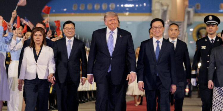 U.S. President Donald Trump participates in an arrival ceremony at Beijing Capital International Airport during his visit to the country, in Beijing, China, May 13, 2026. REUTERS/Evan Vucci