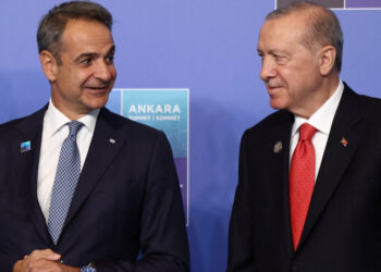 Turkish President Tayyip Erdogan welcomes Greek Prime Minister Kyriakos Mitsotakis at a NATO leaders' summit in Ankara, Turkey, July 8, 2026. REUTERS/Stoyan Nenov