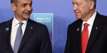 Turkish President Tayyip Erdogan welcomes Greek Prime Minister Kyriakos Mitsotakis at a NATO leaders' summit in Ankara, Turkey, July 8, 2026. REUTERS/Stoyan Nenov