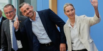 Co-leaders of Alternative for Germany party, or AfD, Alice Weidel, right, and Tino Chrupalla, left, and top candidate for the Saxony-Anhalt state elections Ulrich Siegmund, center, attend a press conference in Berlin, Germany, Monday, Sept. 7, 2026. (AP Photo/Ebrahim Noroozi)